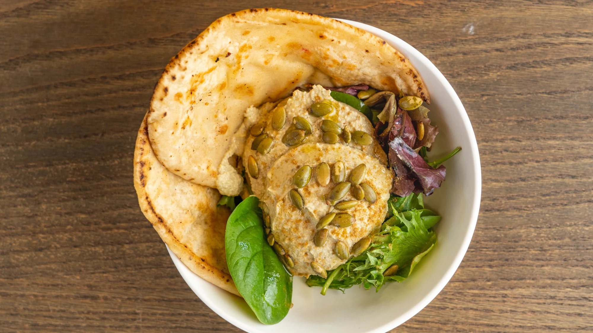 Hummus and pita catering plate